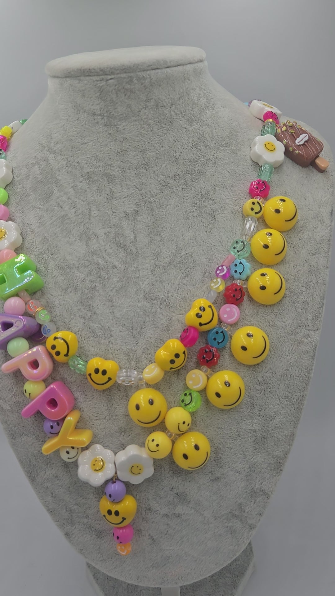 HAPPY, the ultimate festival necklace.
