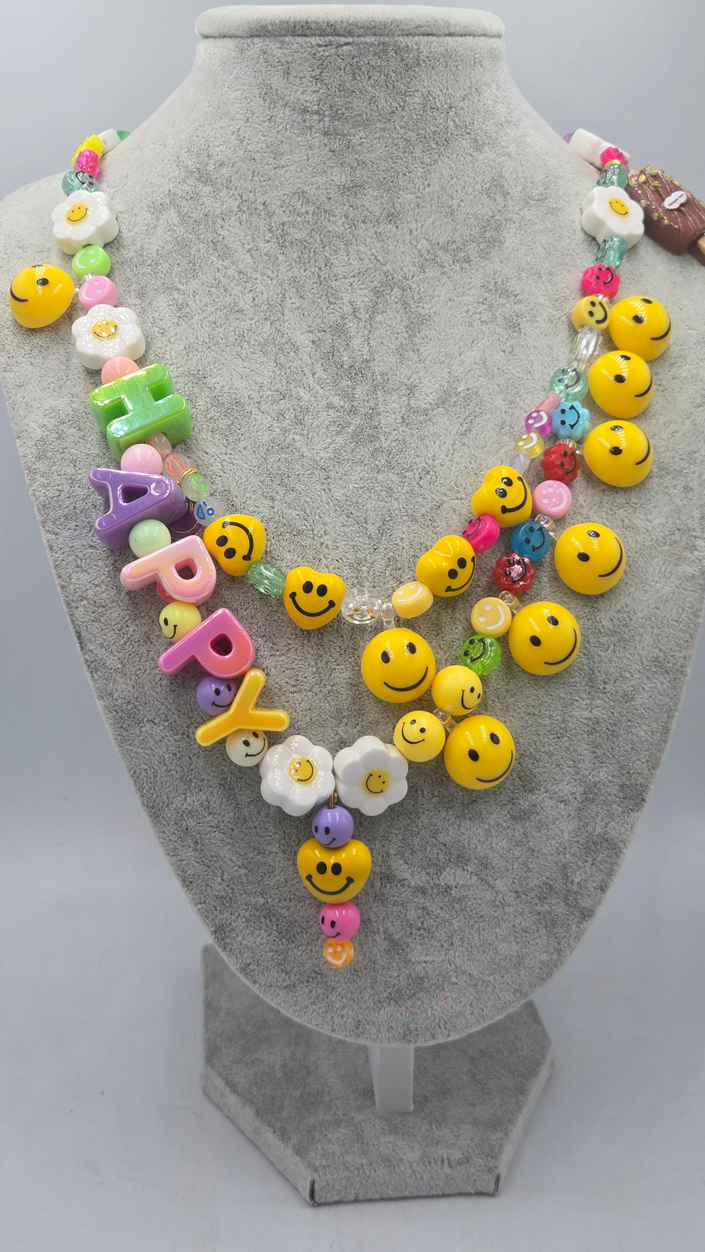 HAPPY, the ultimate festival necklace.