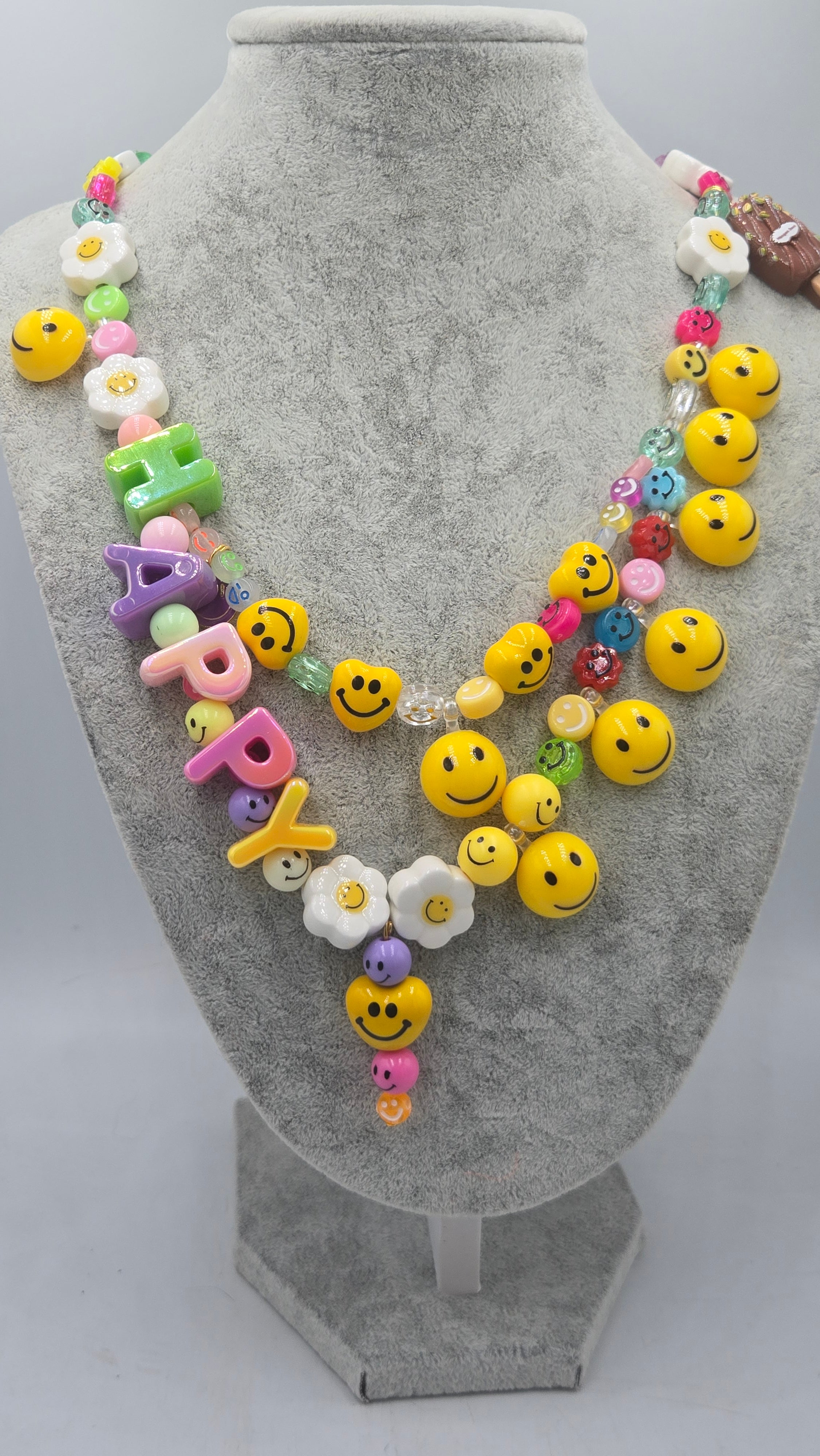 HAPPY, the ultimate festival necklace.