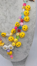 HAPPY, the ultimate festival necklace.