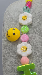 HAPPY, the ultimate festival necklace.