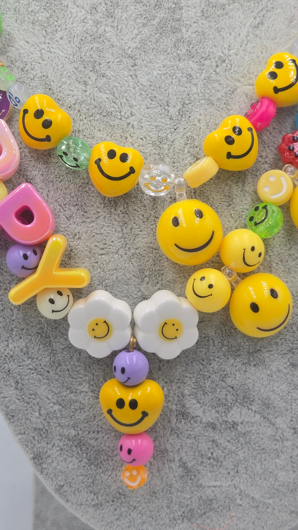 HAPPY, the ultimate festival necklace.