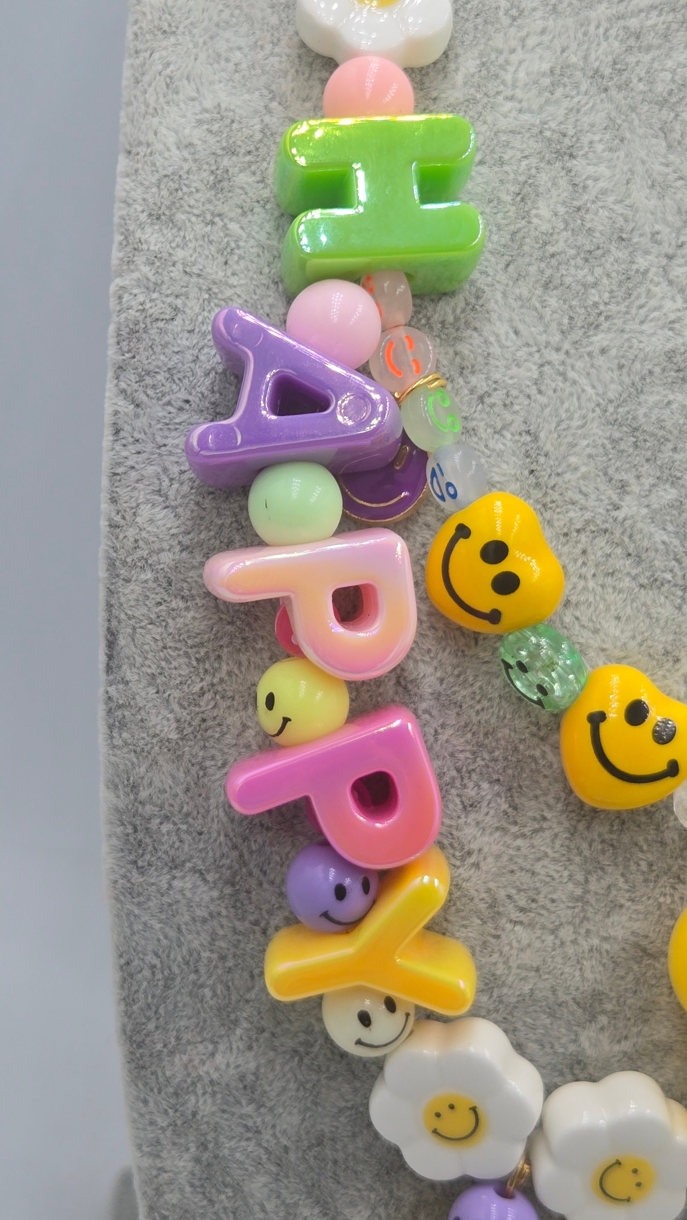 HAPPY, the ultimate festival necklace.