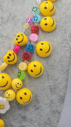 HAPPY, the ultimate festival necklace.
